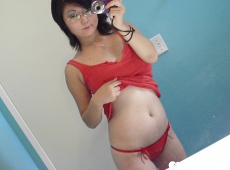 Amateur Asian Girl With Big Tits Takes Sexy Selfies In The Mirror