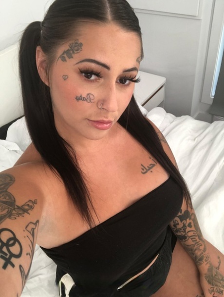 Frank hard, the cocky girlfriend of Chubby girls, exposes her tattooed curvements and large chest area while stripping and flaunting it.