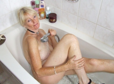 Naughty Mature Housewife Nadja Indulging In Kinky Water Play In The Shower