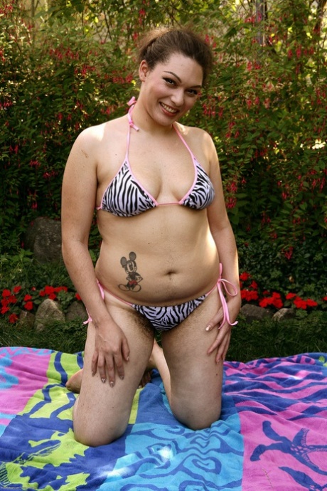 Exotic Fatty Marie Strips Her Bikini And Shows Her Furry Crotch Outside