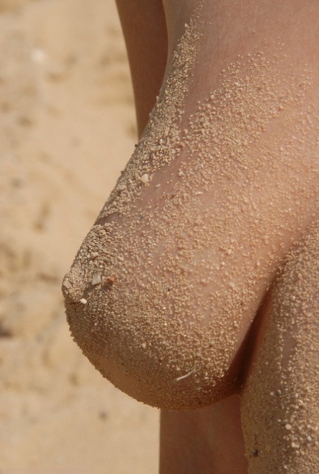 Teen Stany Poses Naked On A Sandy Beach & Shows Her Hairy Pussy Up Close