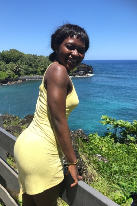 Sweet ebony girlfriend Noemie Bilas strips and poses for her vacation album.