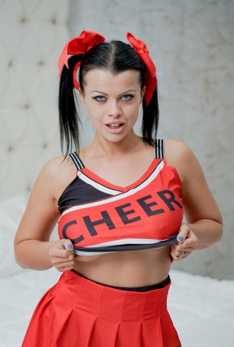 In a show of physical intensity, Nadia White takes on the role of cheerleader with big tits.