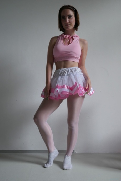 The brunette ballerina, Lia Louise, teases her tutu and sucks into her dance instructor.