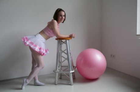 Lia Louise, despite being a brunette ballerina, teases herself while wearing her tutu and then proceeds to suck her dance instructor.