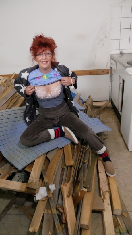 Redheaded Granny With Small Tits Takes A Fat Dick In Her Kitchen