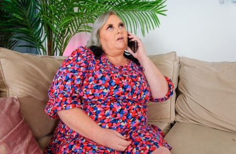 Mature Fatty Luna Posing In Her Summer Dress And Black Shoes On The Sofa