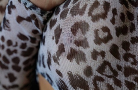 The gorgeous Vi Angel flaunts her ferocious lower body in a leopard print top.