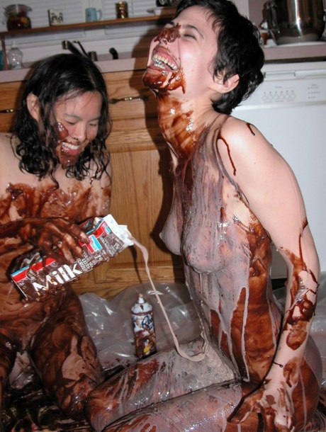 Playful Lesbians Colette & Roxanne Cover Each Other's Bodies With A Chocolate