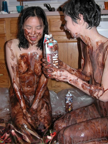 Playful Lesbians Colette & Roxanne Cover Each Other's Bodies With A Chocolate