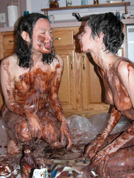 Playful Lesbians Colette & Roxanne Cover Each Other's Bodies With A Chocolate