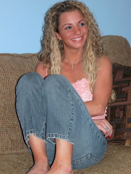 Slender Curly-haired MILF Holly Toys Her Tight Love Hole Up Close On The Sofa