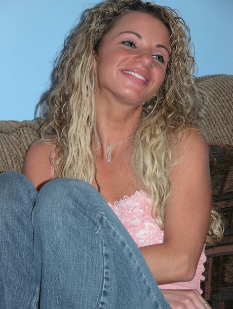 Slender Curly-haired MILF Holly Toys Her Tight Love Hole Up Close On The Sofa