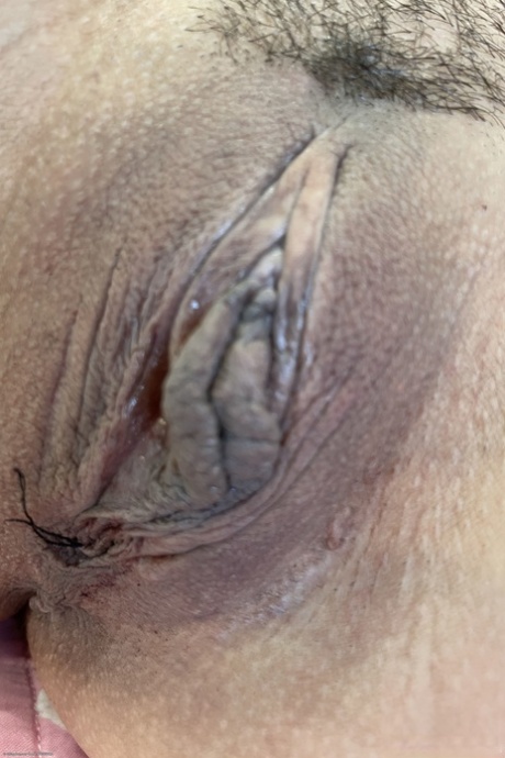 The gaping holes and large buttocks of Kimmy Kimm, an Asian woman in a relationship, are being observed up close.
