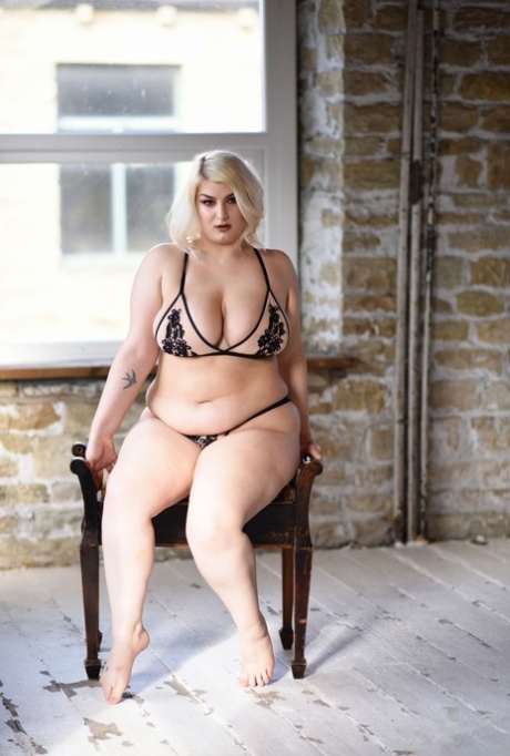 The sexy Peaches is seen in her enviable lingerie and unleashing her massive breasts.