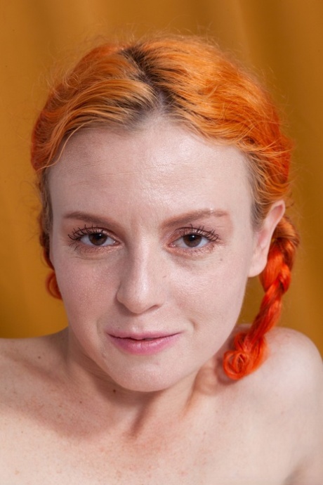 Ellipsey with her hair tied in a playful manner by Eva Strawberry, the little ginger.