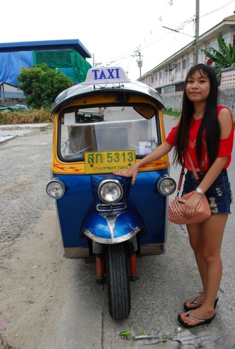 Showing off in booty shorts, Pretty Asian Bew rides in a tuk-tuk and showcased her radiant legs.