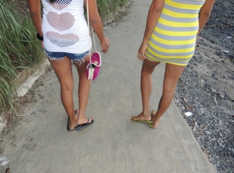 Adorable: Asian amateurs Shanelle Velasco & Bubbles Lacsamana pose for pictures at the beach.