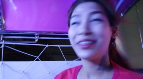 In this video, Bil removes her dress and perform a boner on an Asian girl with big breasts.