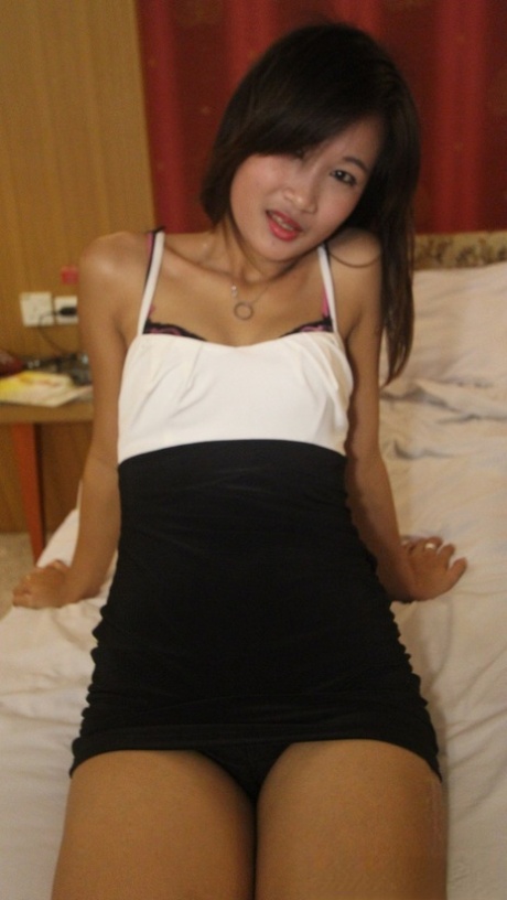 Bik, a gorgeous Asian model, exhibits her petite physique while stripping for POV sex.