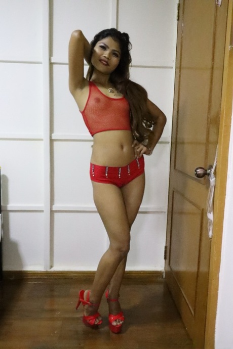 Cute Asian Girl May L Does A Sexy Striptease Wearing High Heels