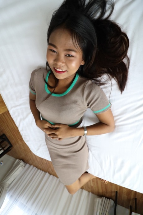 A small Asian girl named Ngon is being creampied and beaten while in POV.