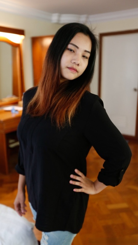 Big breasts: Asian babe Meew shows off her stunningly beautiful countenances close up.