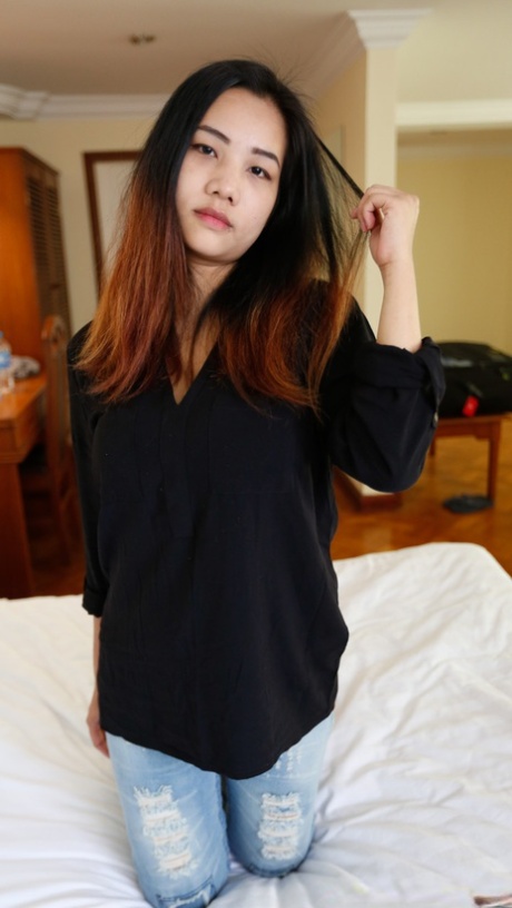 Beautiful Asian babe: Meaw shows off her gorgeous big breasts with close up shots.