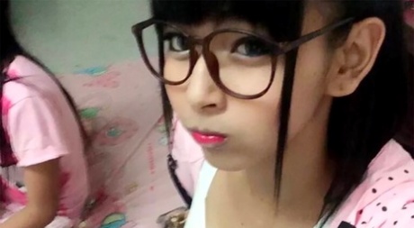 Bigger tits: This tiny Asian shemale takes some daring selfies in this "selfie land" video.