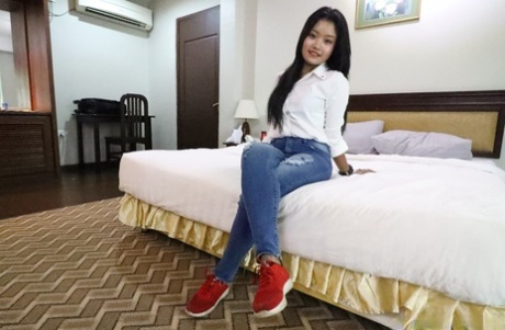 Maprang, a small Thai female, takes a naked sex in POV action while showing off her jeans.