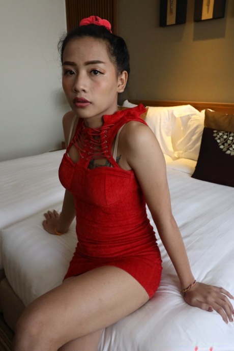Petite Asian Shemale In A Red Dress Flashes Her Undies Before Sucking A Dick
