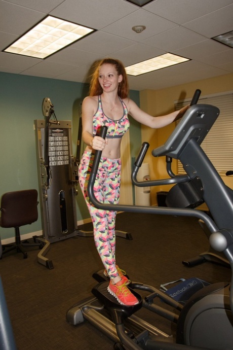 Teen with red hair Wendy Patton gives a sneak peek if her nipple at the gym