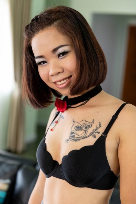 Emo Thai teen Pimya strips to her heels & exposes her firm ass & bald holes