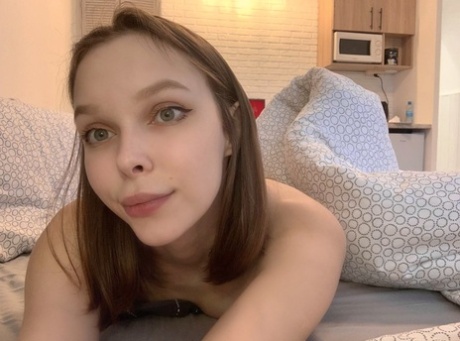 Adorable OnlyFans babe Little Kitty flashes her panties and tits in a solo