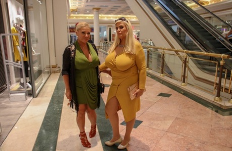 In their seductive dresses, Chubby MILFs Alexa Blun and Musa Libertina make a statement in public.