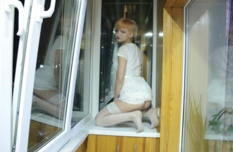 Short-haired Amateur Shows Her Big Ass & Fingers Herself In The Window