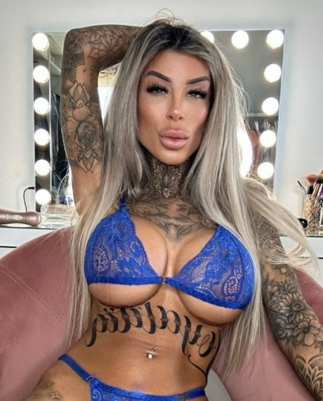 Tattooed Amateur Seductress Jacky Posing In Her Sexy Lace Lingerie