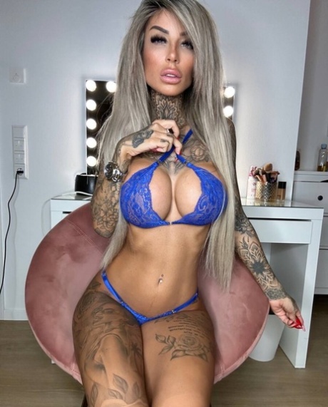Tattooed Amateur Seductress Jacky Posing In Her Sexy Lace Lingerie