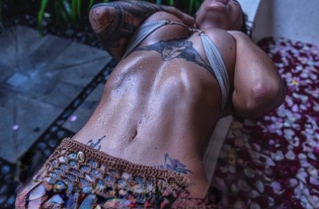 Exotic OnlyFans Doll Angelica Anders Teases With Her Curvy Tattooed Body