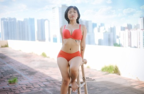 Beautiful Vietnamese Girl Hellen Poses In Her Red Lingerie In Public