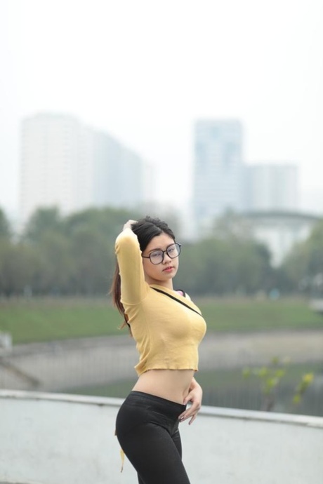 Beautiful Asian Girl Shows Off Her Perfect Body In A Sexy Outfit Outdoors