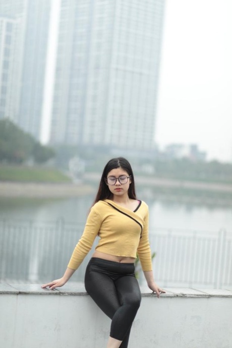 Beautiful Asian Girl Shows Off Her Perfect Body In A Sexy Outfit Outdoors