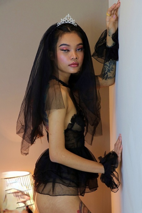 Little Princess Nuchcy Poses In A Seductive Lingerie And Lacy Fishnets
