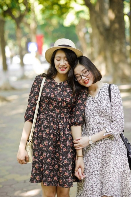 Gorgeous Asian Brunette Girls Posing In Their Summer Dresses In Public