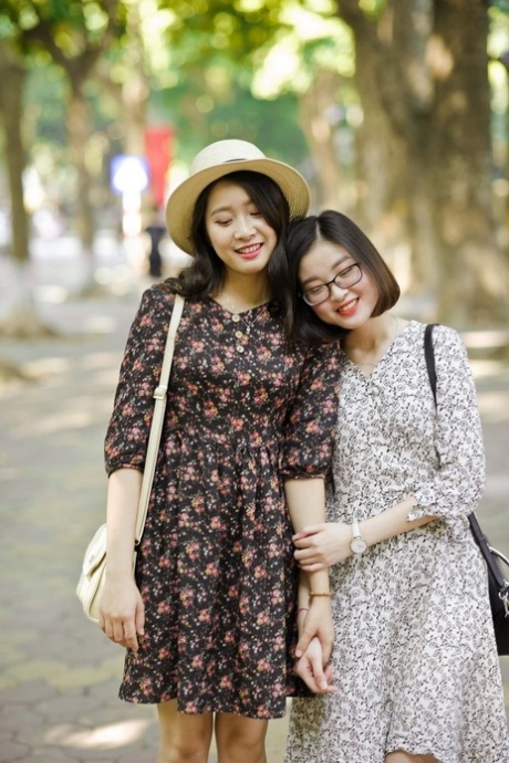 Gorgeous Asian Brunette Girls Posing In Their Summer Dresses In Public