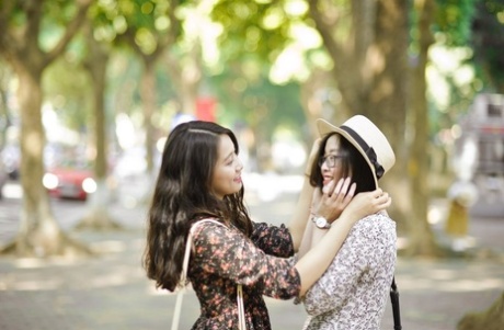 Gorgeous Asian Brunette Girls Posing In Their Summer Dresses In Public