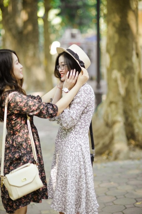 Gorgeous Asian Brunette Girls Posing In Their Summer Dresses In Public