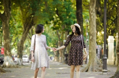 Gorgeous Asian Brunette Girls Posing In Their Summer Dresses In Public