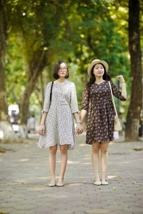 Gorgeous Asian Brunette Girls Posing In Their Summer Dresses In Public