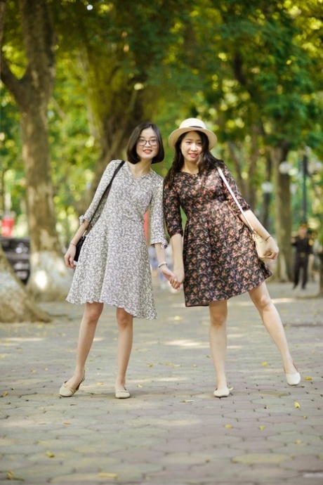 Gorgeous Asian Brunette Girls Posing In Their Summer Dresses In Public